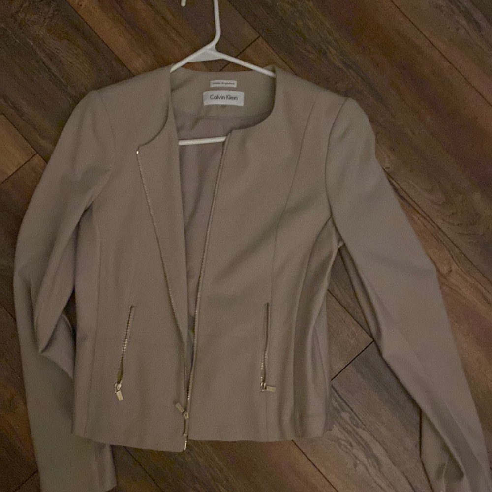 Calvin Klein size 4 minimal womens blazer. New without tags.